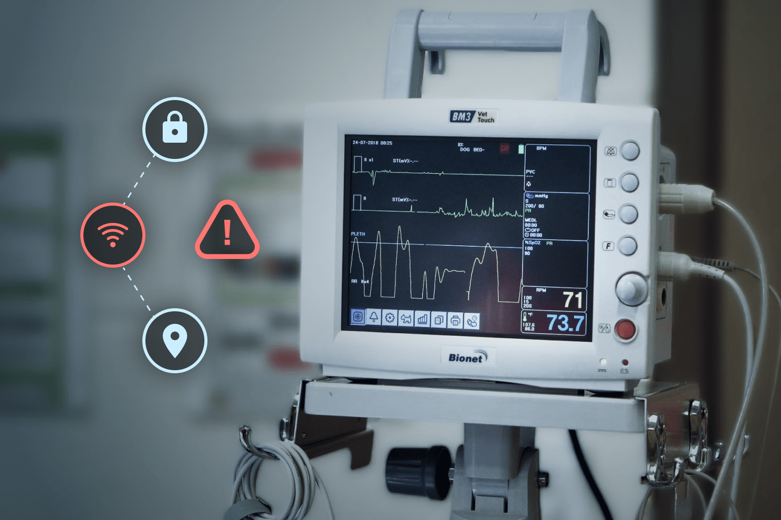 A medical patient monitor with icons for real-time alerts, location, and security, demonstrating advanced tracking technology for high-value hospital equipment.
